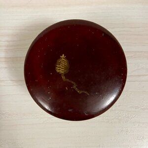 Antique lacquered thread dispenser